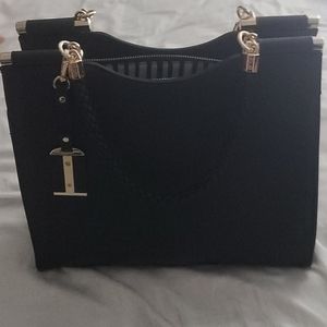 Miztique black hand bag almost new